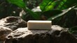 © LOL - Light beige bar of soap on a rock.