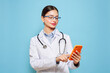 © Oleg Gekman - Hospital, doctor woman with phone for research, reading news or medical information. Clinic, neurologist or texting on mobile app technology for social media, patient record or telehealth