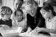 © Olha Havelia - Generations of a family gathered around a table kneading dough,