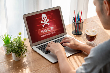 Wall Mural - virus warning alert on computer screen detected modish cyber threat , hacker, computer virus and mal