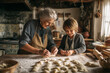 © Michał Magiera - Babcia i wnuczek wspólnie lepią pierogi w domowej kuchni. Rodzinna atmosfera, tradycja i międzypokoleniowe więzi podczas przygotowywania domowego posiłku.