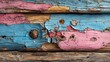 © Muhammad - Weathered wood wall with flaking pink and blue paint. -