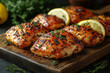 © Nigina - Chicken breasts on wooden cutting board.