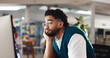 © peopleimages.com - Sleepy, employee and man with computer, office and bored with project on website, tired and burnout. Exhausted, graphic designer and person with tech for task, lazy and overworked in creative agency