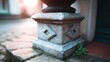 © BOJOShop - Ornate stone pillar base with etched diamond patterns weathered by time