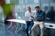 © Westend61 - Teamwork and discussion with manager and colleague in modern office