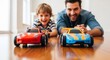 © NE97 - Happy father and son playing with toy cars on the floor. Family time fun for Father's Day, childhood memories, and promoting quality bonding. Toy cars race together.