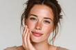 © john - Young woman touching face skin with fingers, performs rejuvenating facial massage. Face skin care, beauty treatment, cosmetic procedure. Close-up portrait of attractive female model, clean natural