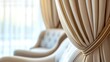 © andi - Creamy drapes, tufted chairs, soft light