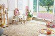 © New Africa - Stylish playroom with toys, furniture and window. Interior design