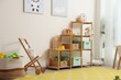 © New Africa - Stylish playroom with toys and furniture. Interior design