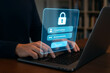 © Roy64 - Person logging into secure digital system using laptop with glowing virtual login interface showing username and password fields for online identity protection