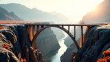 Bridge over canyon with mountains in background