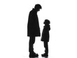 © sirisak - Father looks down at his young son du a silent moment, both silhouetted against a bright white backdrop.