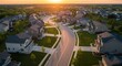 © Muhammad - Aerial sunset scene of curving contemporary American neighborhood street with newly constructed single family residences in the East Coast United States