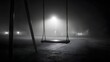 © Neo - An eerie, atmospheric black and white shot of an empty swing in a foggy park at night