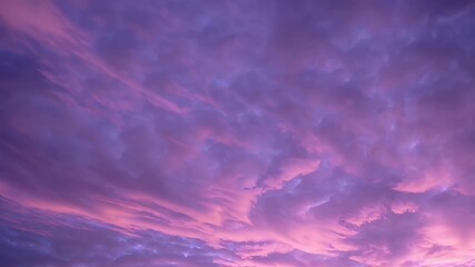 Wall Mural - dreamlike sky filled soft purple blue pink clouds creating lively magical atmosphere vivid 4k looping video perfect surreal joyful ambient