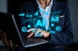 © Arnab Dey - AI agent analyzing data and generating reports. Artificial intelligence and intelligent automation IA technology. Businessman using laptop computer to give instructions to AI at desk in office.