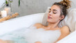 © Taras Vykhopen - Relaxing spa day at home with a soothing bubble bath and tranquil ambiance