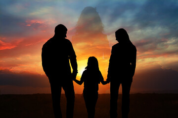 Wall Mural - hope. silhouettes of woman and family in nature at sunset, double exposure