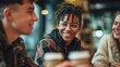 © tygowho - Diverse Friends Enjoying Coffee Shop Conversation