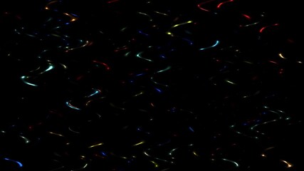 Colorful, rainbow, wavy rays of light on a black background.
