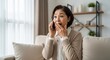 © Stingray_Japan - 詐欺の電話に驚くシニア日本人女性