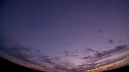 Wall Mural - vibrant 4K timelapse capturing glowing spectrum colorful sunset sky transitioning from orange to deep purple offering visually rich background peaceful dramatic visual