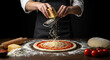 © Meiza - Chef grating cheese onto pizza dough for homemade Italian cuisine