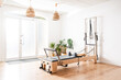 © GALDRIC - Pilates reformer and Cadillac equipment standing in a modern and bright studio