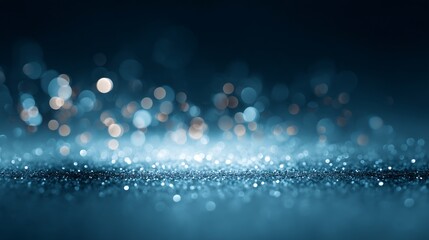 Elegant abstract blue bokeh background with sparkling glitter texture