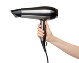 A persons hand holding a sleek modern hairdryer with a black cord against a clean transparent background