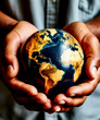 © chochoka - Hands Holding Abstract Globe – Earth Concept in Rough Hands