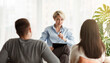 © Prostock-studio - Professional Help. Family Counselor Giving Advice To Married Couple How To Improve Relationship Sitting In Office. Back View, Selective Focus