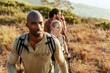 © Marko Geber - Young and diverse group of friends and hikers hiking together in the mountains of south africa