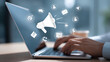 © suldev - Digital marketing strategy. Announce promotions and campaigns via email and social media. Marketer using laptop computer to manage targeted advertising.