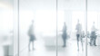 © Renderis - Blurred figures in a bright office space with glass walls and modern design.