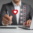 © depdep - Businessperson working with a checklist and heart icon