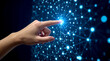 © Ada - Digital transformation conceptual for next generation technology era. human hand, seen from the side, with the index finger touching a bright, glowing blue point within an intricate digital network