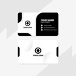 © ilhamkamal - Modern and minimalist business card template design with a black and white color scheme. Professional corporate identity layout for branding.