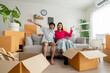 © Kawee - Portrait of Asian transgender woman and male partner moving to new house.