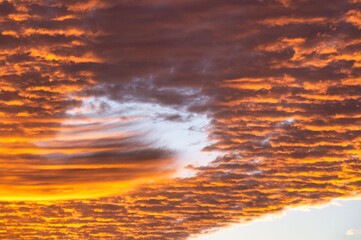 Wall Mural - Vivid Sunset Sky with Dramatic Clouds