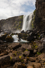 Canvas Print - beautiful water cascade with a lot of rocks.