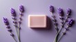 © Photonique - Refreshing organic handmade soft pink soap bar with lavender flowers on pastel violet background, aesthetic spa arrangement for beauty skincare branding and advertising, top view, copy text space