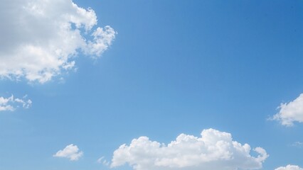 Wall Mural - Gorgeous abstract cloudscape set on a bright blue sky with white background and wallpaper, highlighted by blue textures, smooth light blue gradient, faint glitter, and pastel blue shades