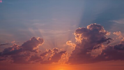 Wall Mural - magnificent twilight view highlighting the sun and colorful clouds