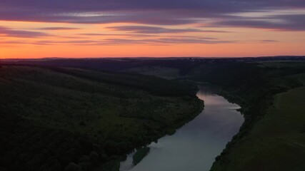 Wall Mural - Aerial drone footage of awesome colorful sunrise over Dniester river. Ukraine, Europe.