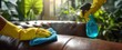 © Olek - The process of cleaning a leather sofa with spray and cloth.