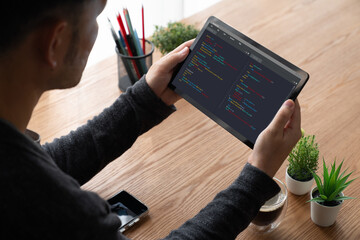 Wall Mural - software development programming on computer screen for modish application and program coding