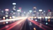 © Designer - Blurry city skyline at night with streaks of light from traffic